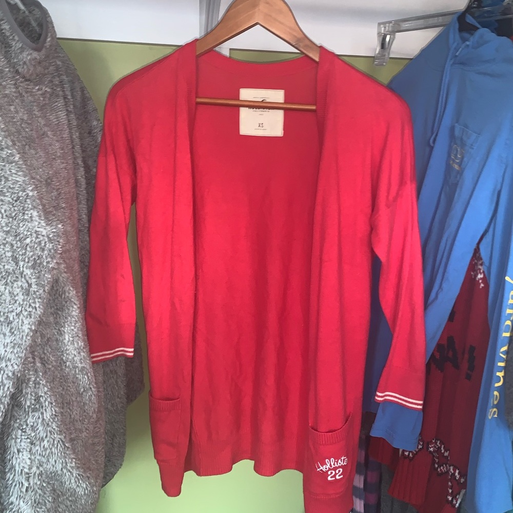 I’m selling a red Hollister cardigan
